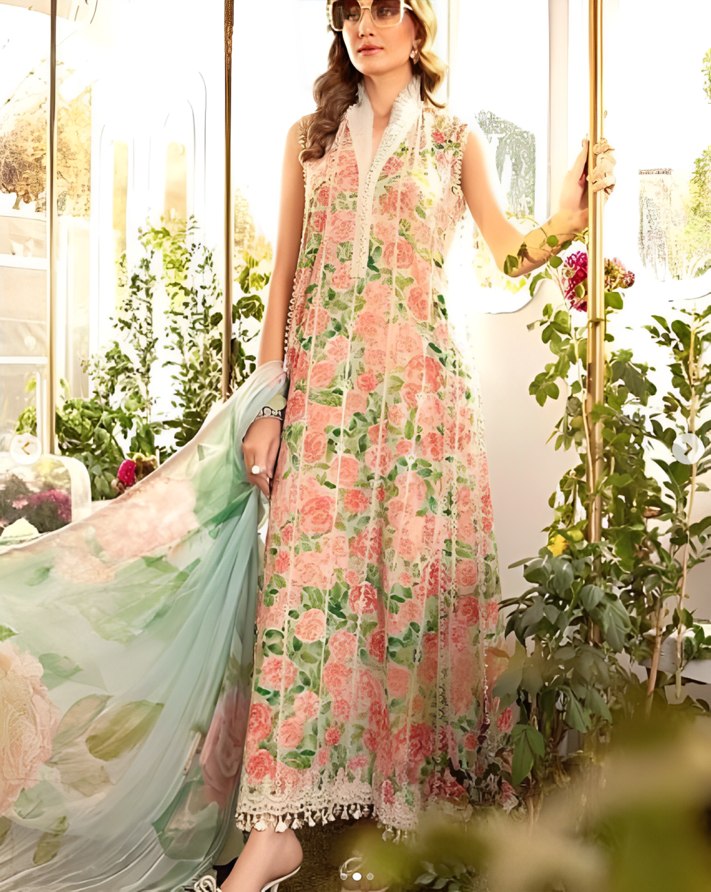 MARIA B Lawn & Silk Ensemble" "Discover MARIA.B's exquisite ensemble featuring a blend of lawn and silk fabrics. Detailed with digital prints, sequin embroidery, and embroidered patches for a luxurious appeal." Product Details: Digital printed 90/70 lawn